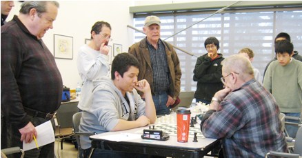 Adrian Villacorta and Dennis Doyle play the endgame. 